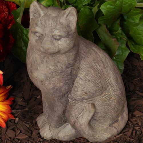 Sitting Cat stone garden sculpture in a seated pose