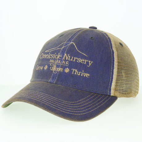 Creekside Hat in a dark woven planter, wide-brimmed shape