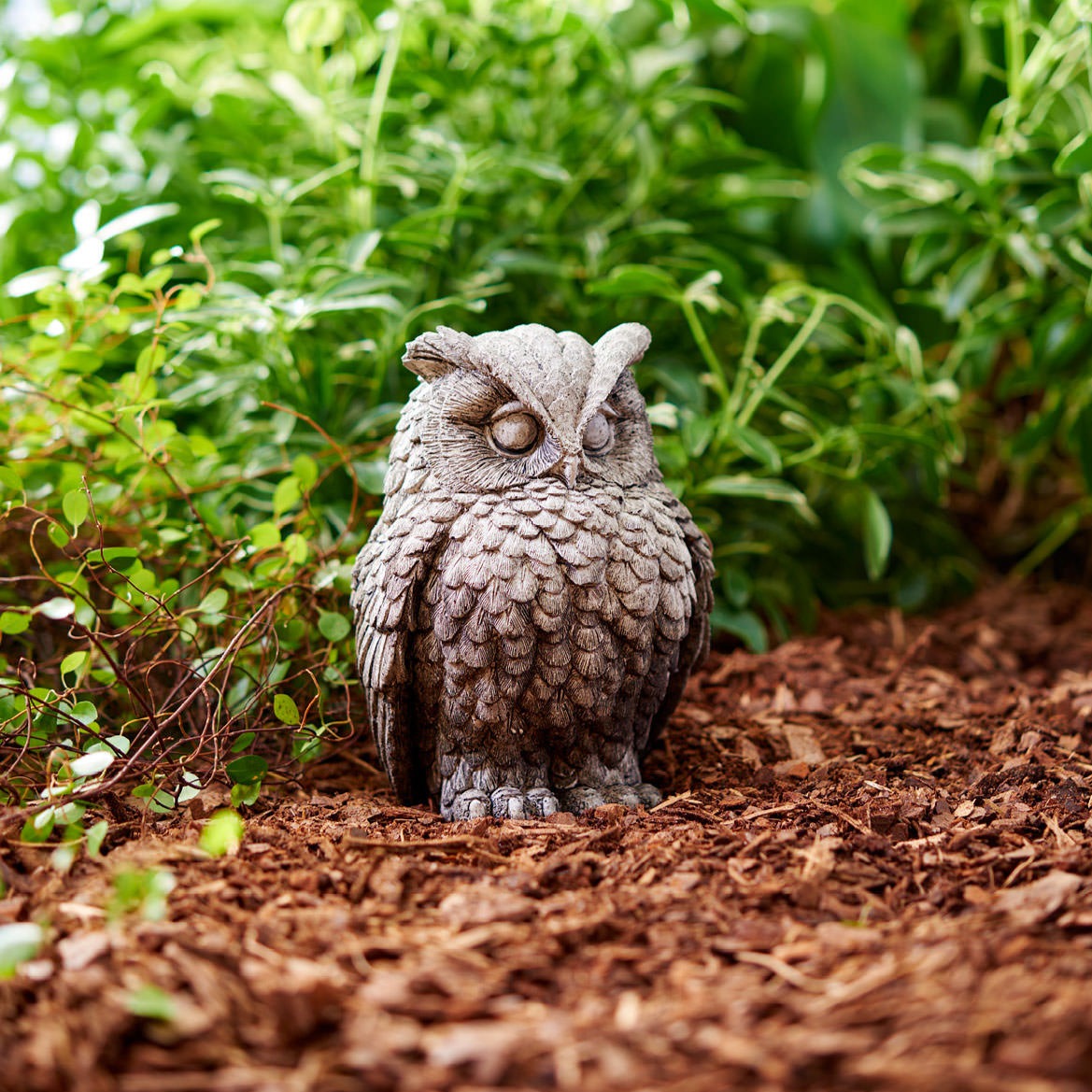 Harry Owl stone figurine with owl features and natural texture