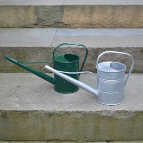 Mini watering can with a curved spout and handle