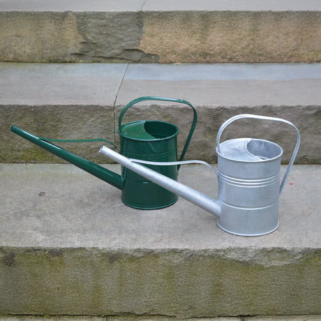 Mini watering can with a curved spout and handle