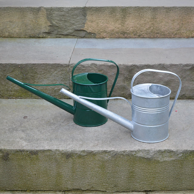 Mini watering can with a curved spout and handle