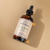 Laurel room spray bottle on a plain background
