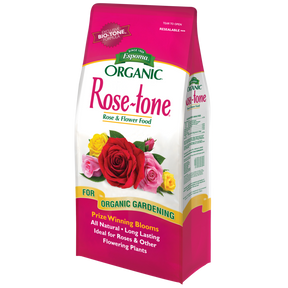 Espoma Rose-tone plant food in a pink and white bag