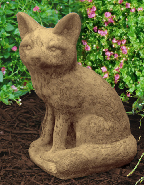 Sitting Fox stone sculpture with a seated fox figure
