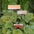 Rose style copper plant labels displayed in a set
